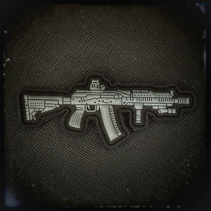 3D PVC Patch with velcro: AK-74 Zentico (Awtomat Kalaschnikowa). The 5.45x39mm rifle was first implemented with the Russian Army in 1976. It underwent multiple design and caliber changes over the years and is considered one of the the best rifles to date. This version is pimped out with zenitco parts. High quality and durable PVC patch for collectors, airsofters and members of the military. Also serves as a morale patch. patchworld.net Patchworld