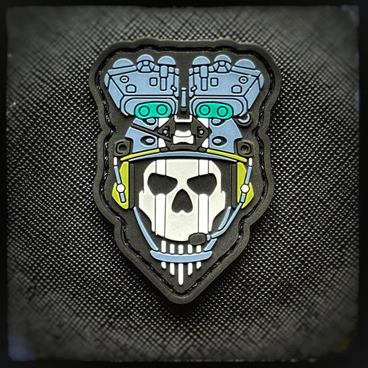 2D PVC patch: Bravo Six Going Dark. Ghosts don’t knock they arrive unseen. And if you notice them, it's already too late. PVC Patch from Ghost, a masked British special forces operator and fan-favorite character from the Call of Duty: Modern Warfare series. High quality and durable PVC, woven and embroidered patches for collectors, airsofters and military enthusiasts. Also serves as a morale patch.