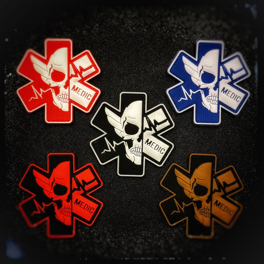 3D PVC patch with velcro: Medic Team ID skull patches

Saving lives is everything but boring. Whether you’re on the frontlines as a combat medic or in public, this patch reminds everyone that medics don’t just heal—they can also soar through the chaos. For those who answer the call, no matter the cost, with a little bit of grit and a lot of heart. High quality and durable PVC, woven and embroidered patches for collectors, airsofters and military enthusiasts. Also serves as a morale patch.