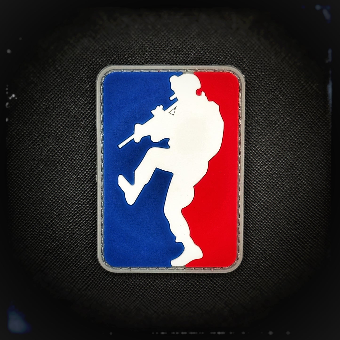 PVC Patch with velcro. This patch features a soldier mid-kick, sending that door flying open like it’s got an overdue rent notice. The design is a nod to Major League Gaming (MLG), where pro gamers flex their skills in virtual battlefields, but let’s be real—kicking in doors is the real-life sport of champions. High quality and durable patch for collectors, airsofters and members of the military. Also serves as a morale patch. Patchworld. patchworld.net